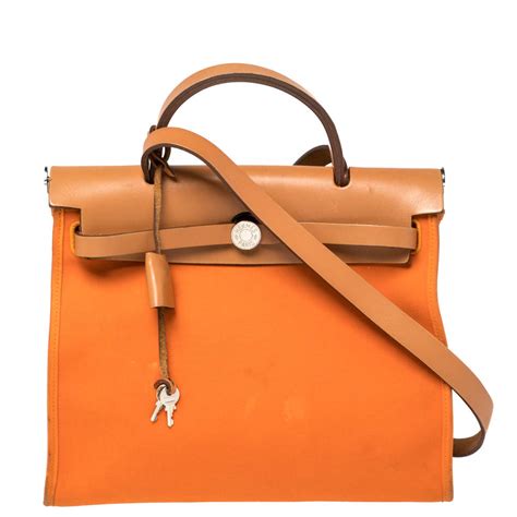 orange hermes leather bag|More.